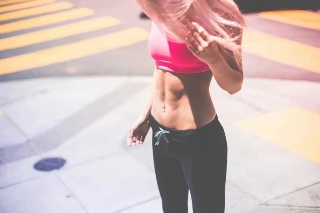 Woman with toned stomach after LA-EMS Body Sculpting Treatment Sandbach